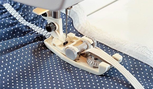Piedino per elastici con guida